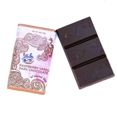 Dark chocolate bar with packaging on a white background