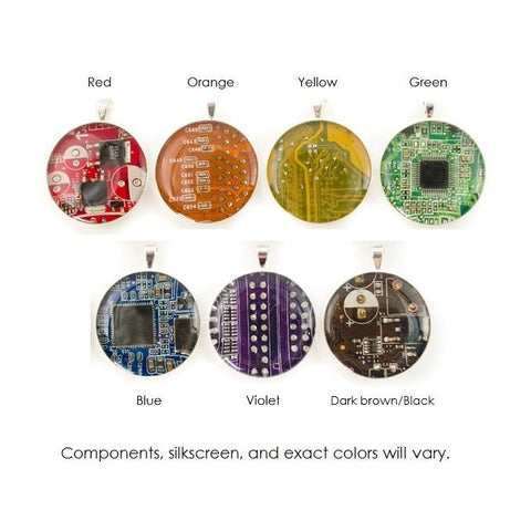 Set of seven circuit board pendants in various colors on a white background.