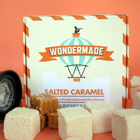 Box of Wondermade salted caramel candy with marshmallows on an orange background