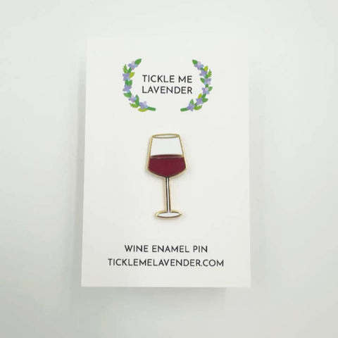 Wine glass enamel pin on a white card with 'Tickle Me Lavender' branding.