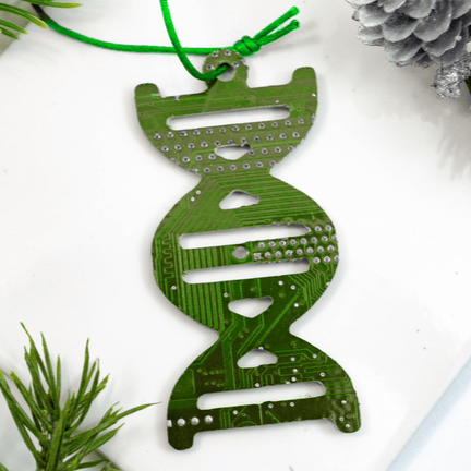 DNA-shaped ornament on a white surface with greenery