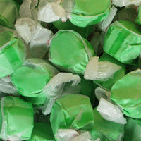 Close-up of green and white candy pieces