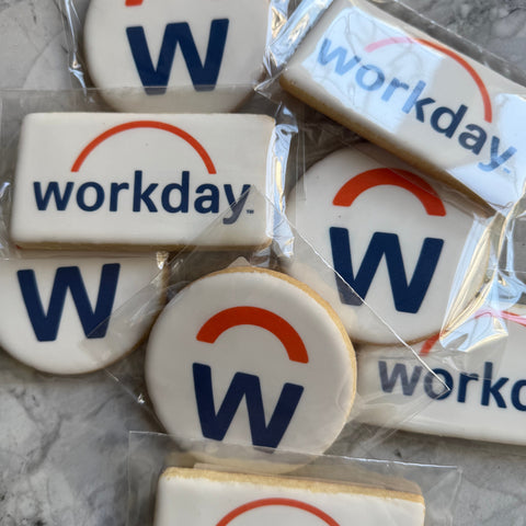Cookies with Workday logo on a marble surface