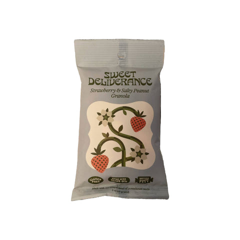 Sweet Deliverance Strawberry & Salty Peanut Granola package on a beige background