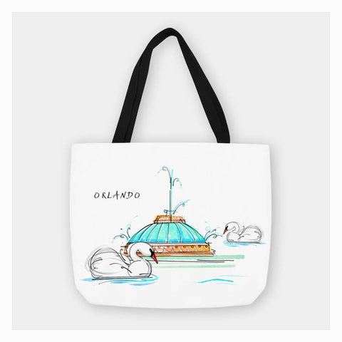 Tote bag with artistic design of swans and a building labeled 'Orlando' on a white background