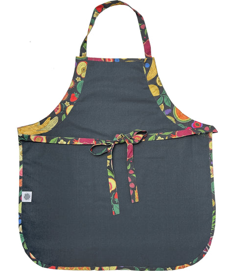 Black apron with colorful fruit pattern on a white background