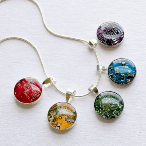 Necklace with colorful circuit board pendants on a white background