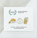 Three enamel pins of Ebi Nigiri, Dumpling, and Boba Milk Tea on a card with 'Tickle Me Lavender' branding.