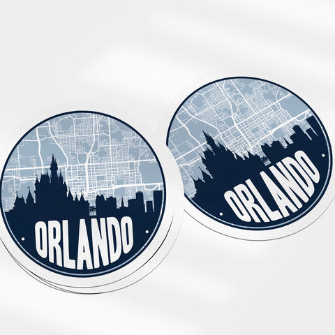 Two round stickers with map design and 'Orlando' text on a white background