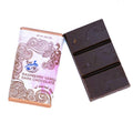 Dark chocolate bar with packaging on a white background