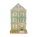 Pin with a design of a green house on a white background