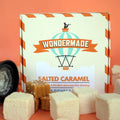 Box of Wondermade salted caramel candy with marshmallows on an orange background