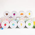 Set of colorful cookie cutters with labels on a white background