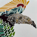 Colorful mosaic art of a rooster on a white background
