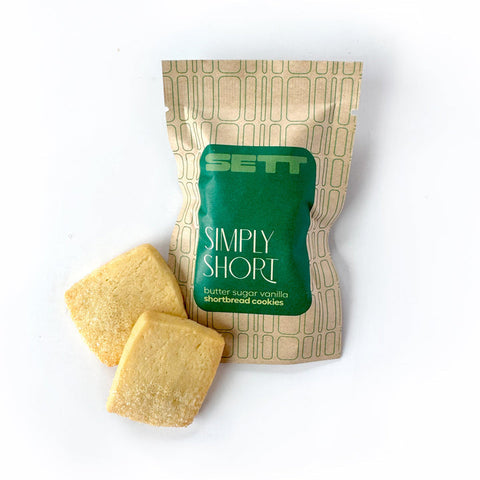 Sett Simply Short butter sugar shortbread cookies with packaging on a white background