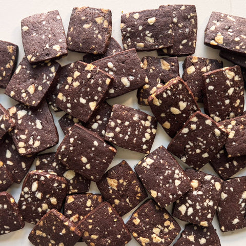 Chocolate bars with nuts on a white background