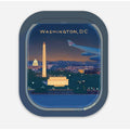 Window view of Washington, DC with the Washington Monument and Lincoln Memorial at night.