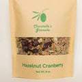 Kraft paper packaging of Chantelle's Granola Hazelnut Cranberry flavor on a light beige background