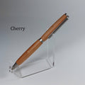 A cherry wood pen with silver metal accents displayed on a clear acrylic stand against a light gray background, with the word 'Cherry' printed on the left.