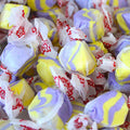 Assorted colorful candies with visible brand logo
