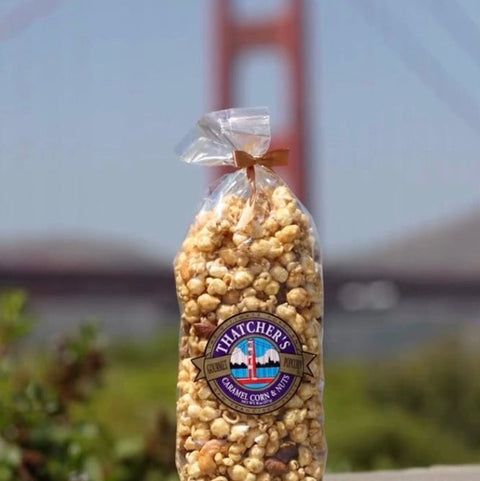 Bag of Thatcher's popcorn with the Golden Gate Bridge in the background