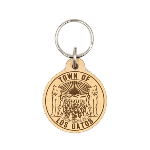 Wooden keychain with 'Town of Los Gatos' design on a white background