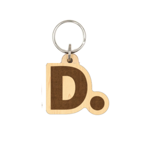 Wooden keychain with letter 'D' on a white background