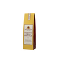 Yellow packaging of Chardonnay wine brittle on a white background