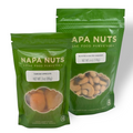 Two green packages of Napa Nuts on a white background